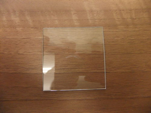 50mm x 50mm Glass - Curved Surface Flat Bottom - 2.5mm Thick Center to 1mm Edge
